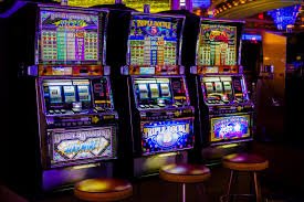 Tampilan permainan Bonanza Gold di wolutoto menampilkan grid buah-buahan berwarna dan simbol bonus